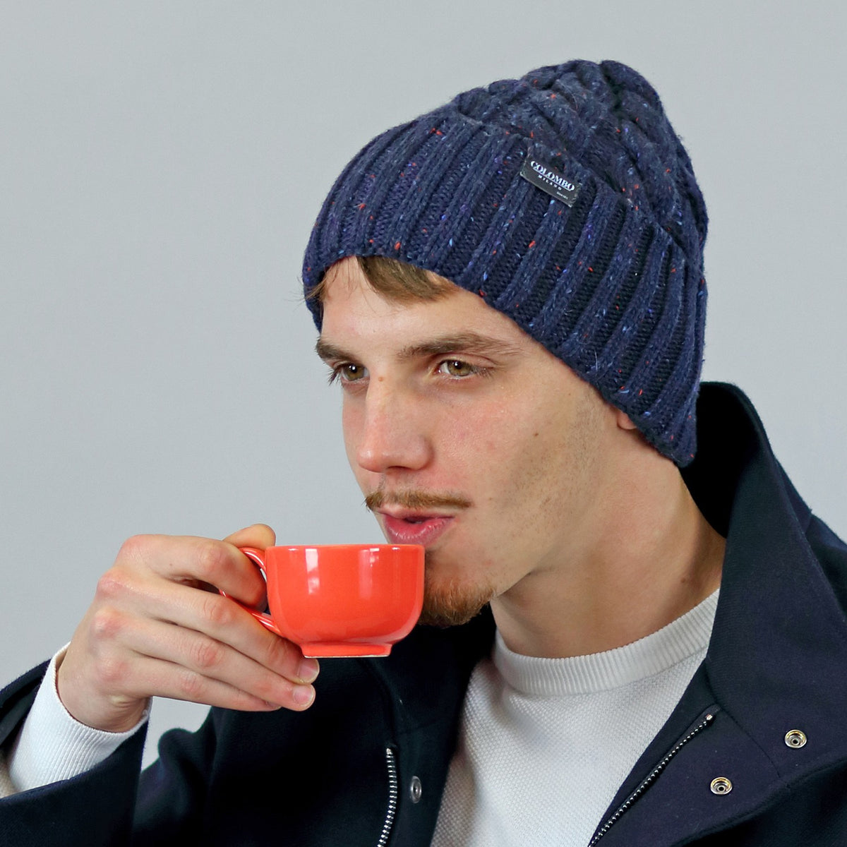 Cappello uomo a trecce misto lana filato bottonato modello