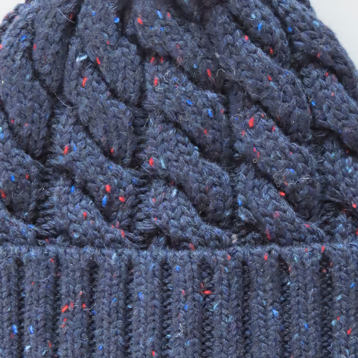 Cappello uomo a trecce lana filato bottonato
