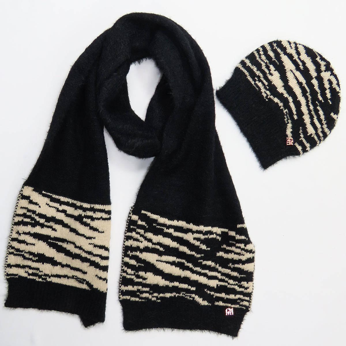 Cappello e sciarpa pelosi animalier